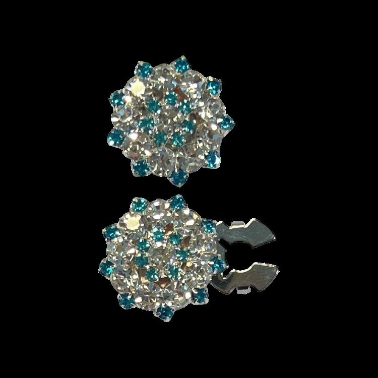 Blank blomst med turkise og klare glass steiner stjerne med sølv